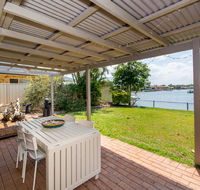 Lowset home on the canal - Dolphin Dr Bongaree - e-Seniors