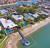 Coorumbong 16 - 5 BDRM Canal Home with Pool - e-Seniors