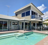 Coorumbong 36 - 6 BDRM Canal Home With Pool - e-Seniors
