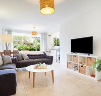 Light and airy garden apartment steps from surf - e-Seniors