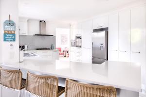 Relax At Bokarina Beach House Walk To Beach Relax By The Pool - e-Seniors 3